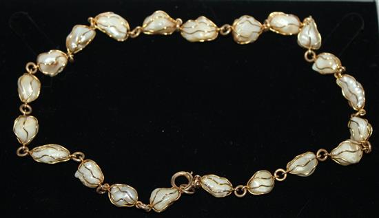 Gold and baroque pearl necklace